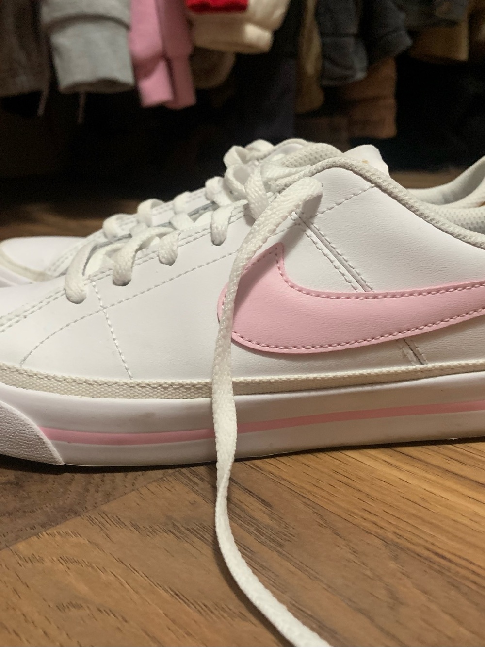 Nike White Low-Top Sneakers with Pink Swoosh
